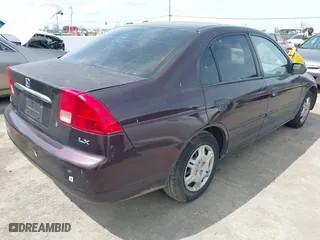 2001 Honda Civic LX with VIN 2HGES165X1H581899, listed as a IAAI auction lot 41989387 with 183,935 mi miles. Bid and sale history available at carsss.com. Image 4.