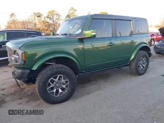 2023 Ford Bronco z VIN 1FMEE5DP2PLB43810, wystawiony jako IAAI lot #41656885 z przebiegiem 22 178 mil mil oraz . Historia ofert i sprzedaży dostępna na DreamBid. Obrazek 2.