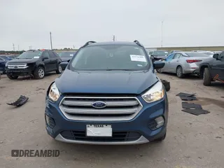 2018 Ford Escape SE with VIN 1FMCU0GD0JUC58115, listed as a IAAI auction lot 41578309 with 76,162 mi miles. Bid and sale history available at carsss.com. Image 12.
