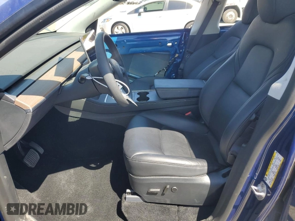 2024 Tesla Model Y Long Range z VIN 7SAYGAEE3RF034699, wystawiony jako Copart lot #54523815 z przebiegiem 9 764 mil mil oraz Szkoda całkowita • Salvage title. Historia ofert i sprzedaży dostępna na DreamBid. Obrazek 7.