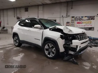 2021 Jeep Compass Limited with VIN 3C4NJCCB0MT576990, listed as a IAAI auction lot 41710809 with 77,903 mi miles. Bid and sale history available at carsss.com. Image 1.