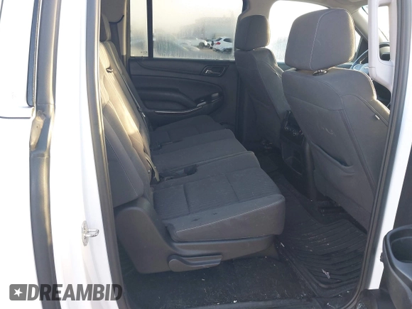 2018 Chevrolet Suburban LS with VIN 1GNSKGKC5JR173889, listed as a IAAI auction lot 42152865 with 73,358 mi miles and . Bid and sale history available at DreamBid. Image 8.