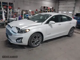 2019 Ford Fusion Hybrid Titanium with VIN 3FA6P0RU8KR277421, listed as a IAAI auction lot 41558399 with 78,873 mi miles. Bid and sale history available at carsss.com. Image 17.