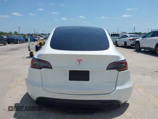 2023 Tesla Model Y Long Range with VIN 7SAYGDEE7PF865539, listed as a IAAI auction lot 42109673 with 34,923 mi miles and . Bid and sale history available at DreamBid. Image 16.