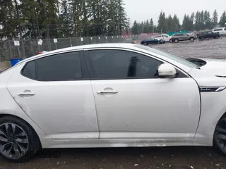 2015 Kia Optima SXL Turbo z VIN 5XXGR4A66FG510911, wystawiony jako IAAI lot #41855352 z przebiegiem 150 576 mil mil oraz . Historia ofert i sprzedaży dostępna na DreamBid. Obrazek 12.