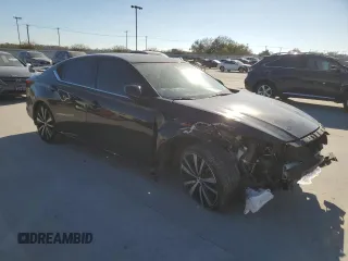 2022 Nissan Altima 2.0 SR with VIN 1N4AL4CVXNN326172, listed as a Copart auction lot 82475634 with 77,390 mi miles and Salvage Title. Bid and sale history available at carsss.com. Image 4.