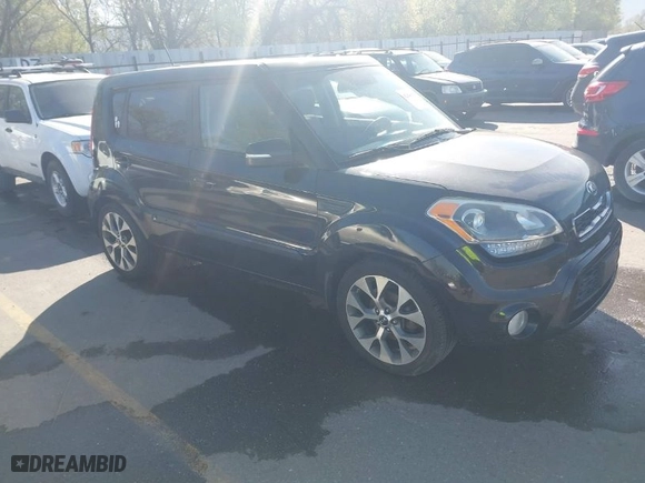 2013 Kia Soul + with VIN KNDJT2A62D7619416, listed as a IAAI auction lot 42046150 with 116,851 mi miles. Bid and sale history available at carsss.com. Image 1.