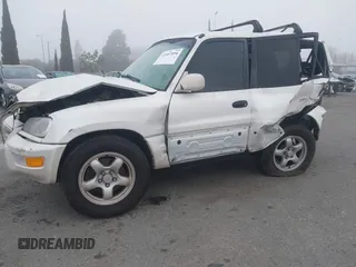 1999 Toyota RAV4 with VIN JT3GP10V0X7050334, listed as a IAAI auction lot 41607894 with 348,069 mi miles and . Bid and sale history available at DreamBid. Image 2.