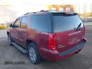 2007 GMC Yukon SLT with VIN 1GKFK13037J336725, listed as a IAAI auction lot 41434331 with 171,479 mi miles. Bid and sale history available at carsss.com. Image 3.