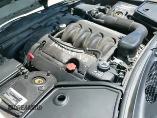 2000 Jaguar XK z VIN SAJJA42CXYNA06374, wystawiony jako IAAI lot #43099086 z przebiegiem 118 320 mil mil oraz . Historia ofert i sprzedaży dostępna na DreamBid. Obrazek 12.