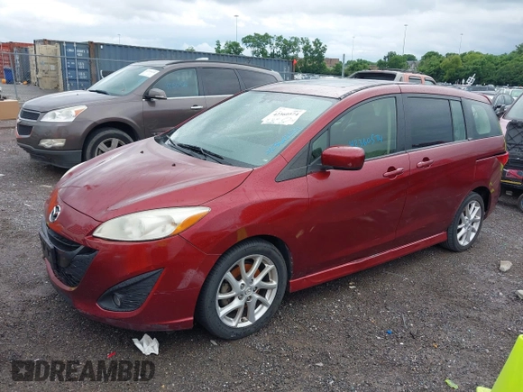 2012 Mazda 5 Grand Touring with VIN JM1CW2DLXC0134997, listed as a IAAI auction lot 42360574 with 230,951 mi miles and . Bid and sale history available at DreamBid. Image 12.