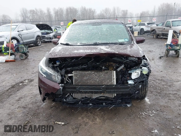 2017 Kia Forte LX with VIN 3KPFK4A7XHE071992, listed as a IAAI auction lot 42039101 with 76,682 mi miles. Bid and sale history available at carsss.com. Image 6.