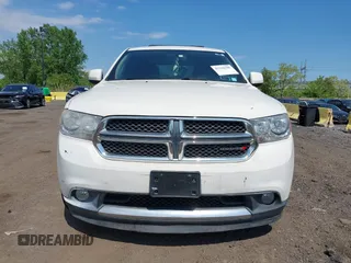 2012 Dodge Durango SXT z VIN 1C4RDJAG0CC294998, wystawiony jako IAAI lot #42230396 z przebiegiem 62 963 mil mil oraz . Historia ofert i sprzedaży dostępna na DreamBid. Obrazek 12.