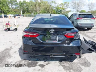 2023 Toyota Camry SE with VIN 4T1G11AK6PU741172, listed as a IAAI auction lot 41599909 with 56,668 mi miles and . Bid and sale history available at DreamBid. Image 16.