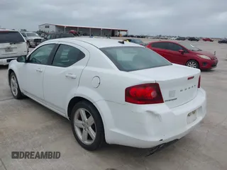 2013 Dodge Avenger SE with VIN 1C3CDZAB3DN707581, listed as a IAAI auction lot 41966051 with 159,054 mi miles and . Bid and sale history available at carsss.com. Image 3.