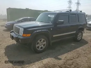 2007 Jeep Commander Limited z VIN 1J8HG58P27C520330, wystawiony jako Copart lot #54595745 z przebiegiem 168 908 mil mil oraz Szkoda całkowita • Salvage title. Historia ofert i sprzedaży dostępna na DreamBid. Obrazek 14.