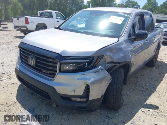 2021 Honda Ridgeline Sport with VIN 5FPYK3F10MB021413, listed as a IAAI auction lot 39847416 with 28,044 mi miles and . Bid and sale history available at DreamBid. Image 6.