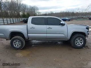2019 Toyota Tacoma 4WD SR with VIN 3TMGZ5AN8KM259475, listed as a IAAI auction lot 41569810 with 61,405 mi miles. Bid and sale history available at carsss.com. Image 13.