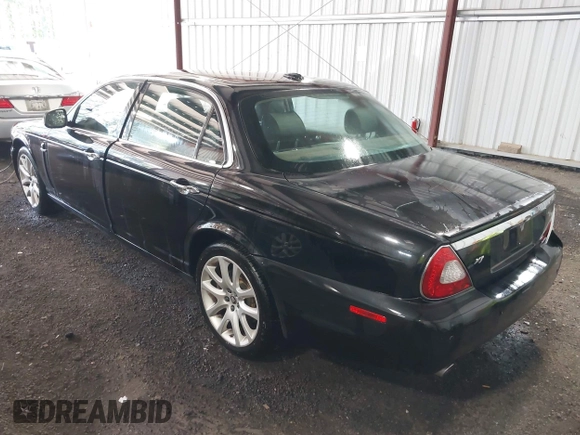 2009 Jaguar XJ 8 LWB with VIN SAJWA79B29SH31572, listed as a IAAI auction lot 42138154 with 147,500 mi miles and . Bid and sale history available at DreamBid. Image 3.