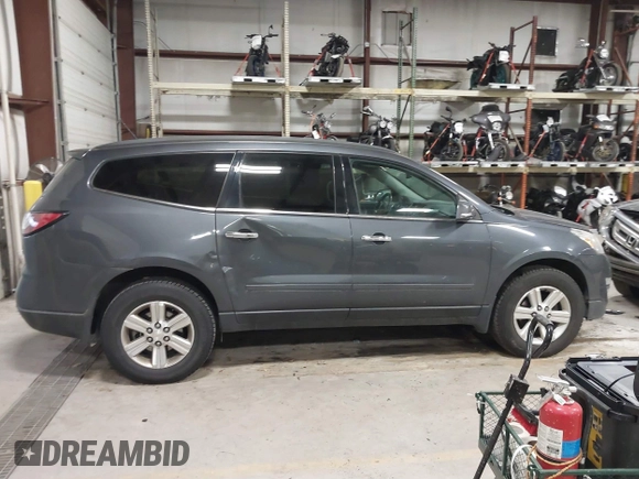 2013 Chevrolet Traverse LT with VIN 1GNKVJKD9DJ152592, listed as a IAAI auction lot 41143281 with 199,259 mi miles and . Bid and sale history available at DreamBid. Image 13.