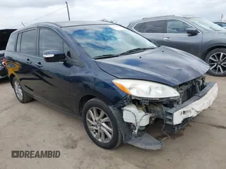 2014 Mazda 5 Sport z VIN JM1CW2BL1E0176111, wystawiony jako IAAI lot #42060863 z przebiegiem 121 814 mil mil oraz . Historia ofert i sprzedaży dostępna na DreamBid. Obrazek 1.