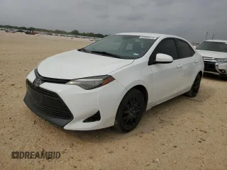 2019 Toyota Corolla L z VIN 5YFBURHEXKP860594, wystawiony jako Copart lot #53204515 z przebiegiem 136 565 mil mil oraz Szkoda całkowita • Salvage title. Historia ofert i sprzedaży dostępna na DreamBid. Obrazek 1.