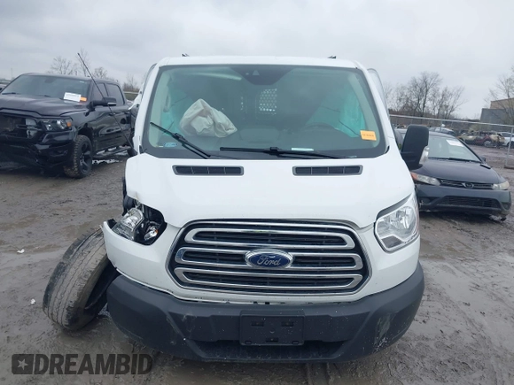 2019 Ford Transit with VIN 1FTYR2YG6KKB47274, listed as a IAAI auction lot 41967189 with 187,594 mi miles and . Bid and sale history available at DreamBid. Image 12.