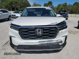 2023 Honda Pilot EX-L 8 Passenger with VIN 5FNYG2H49PB008353, listed as a Copart auction lot 76395124 with 158,867 mi miles and Non Repairable. Bid and sale history available at carsss.com. Image 5.
