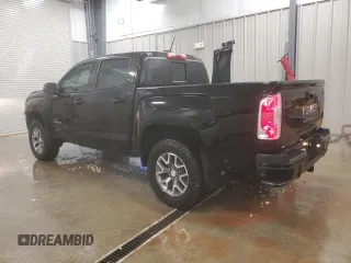 2021 GMC Canyon 4WD AT4 w/Cloth with VIN 1GTG6FEN0M1106579, listed as a Copart auction lot 81330184 with 29,630 mi miles and Salvage Title. Bid and sale history available at carsss.com. Image 2.