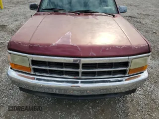 1996 Dodge Dakota z VIN 1B7FL26X0TS581123, wystawiony jako Copart lot #55069395 z przebiegiem 133 707 mil mil oraz Szkoda całkowita • Salvage title. Historia ofert i sprzedaży dostępna na DreamBid. Obrazek 11.