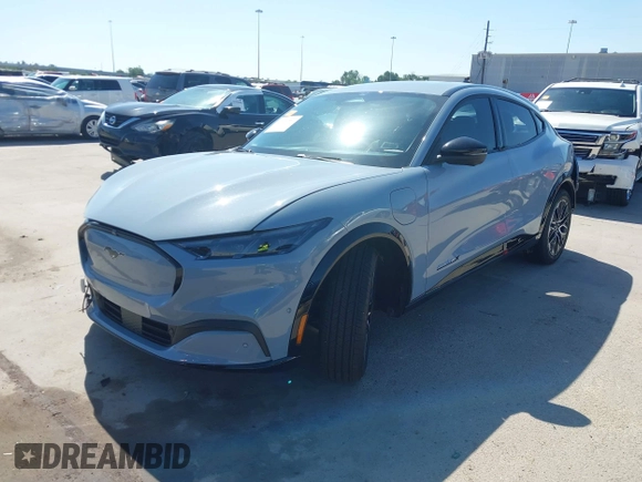 2024 Ford Mustang Mach-E Premium z VIN 3FMTK3R78RMA29034, wystawiony jako IAAI lot #41966583 z przebiegiem 2095 mil mil oraz . Historia ofert i sprzedaży dostępna na DreamBid. Obrazek 21.