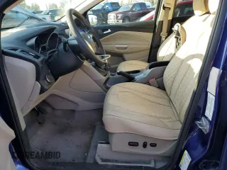 2014 Ford Escape SE z VIN 1FMCU9G95EUB88150, wystawiony jako Copart lot #52570095 z przebiegiem 143 129 mil mil oraz Szkoda całkowita • Salvage title. Historia ofert i sprzedaży dostępna na DreamBid. Obrazek 7.