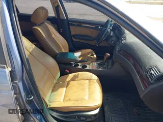 2005 BMW 3 Series 325xi with VIN WBAEU33465PR19734, listed as a IAAI auction lot 42006438 with 130,281 mi miles. Bid and sale history available at carsss.com. Image 5.