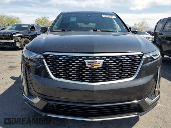 2020 Cadillac XT6 FWD Premium Luxury z VIN 1GYKPCRS9LZ126510, wystawiony jako Copart lot #58240585 z przebiegiem 57 156 mil mil oraz Szkoda całkowita • Salvage title. Historia ofert i sprzedaży dostępna na DreamBid. Obrazek 5.