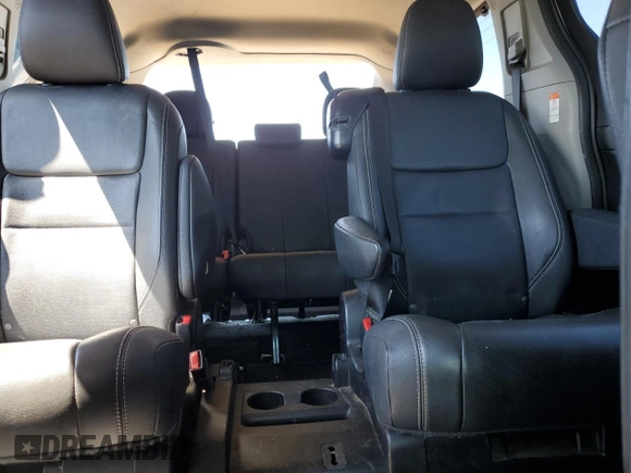 2015 Toyota Sienna SE with VIN 5TDXK3DC7FS546041, listed as a Copart auction lot 53992165 with 106,259 mi miles and Salvage Title. Bid and sale history available at carsss.com. Image 10.