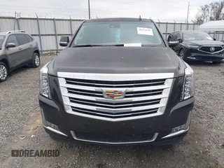 2016 Cadillac Escalade Platinum z VIN 1GYS4DKJ1GR363238, wystawiony jako IAAI lot #40974636 z przebiegiem 128 296 mil mil oraz . Historia ofert i sprzedaży dostępna na DreamBid. Obrazek 12.