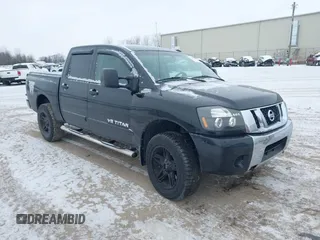 2008 Nissan Titan XE with VIN 1N6AA07CX8N349034, listed as a IAAI auction lot 41275699 with 158,823 mi miles and . Bid and sale history available at DreamBid. Image 1.