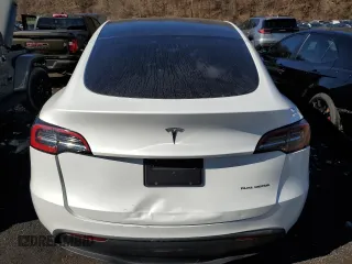 2023 Tesla Model Y Long Range z VIN 7SAYGDEE5PF785124, wystawiony jako Copart lot #47072345 z przebiegiem 31 341 mil mil oraz Szkoda całkowita • Salvage title. Historia ofert i sprzedaży dostępna na DreamBid. Obrazek 6.