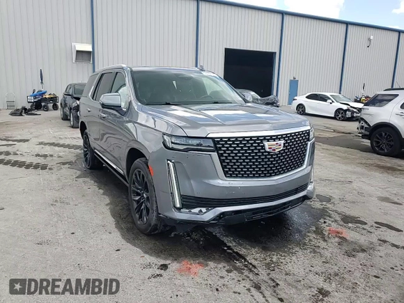 2021 Cadillac Escalade Premium Luxury z VIN 1GYS3CKL8MR244497, wystawiony jako Copart lot #52582135 z przebiegiem 73 326 mil mil oraz Szkoda całkowita • Salvage title. Historia ofert i sprzedaży dostępna na DreamBid. Obrazek 14.