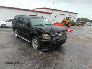 2007 Chevrolet Tahoe LT z VIN 1GNFK13097R161322, wystawiony jako IAAI lot #41121872 z przebiegiem 148 088 mil mil oraz . Historia ofert i sprzedaży dostępna na DreamBid. Obrazek 1.