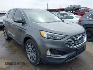 2022 Ford Edge Titanium with VIN 2FMPK4K93NBA14018, listed as a IAAI auction lot 41878548 with 52,515 mi miles. Bid and sale history available at carsss.com. Image 1.