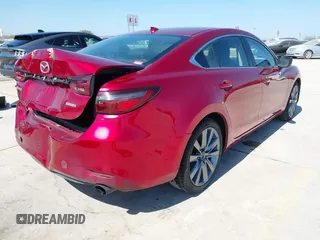 2020 Mazda 6 Grand Touring with VIN JM1GL1TY7L1511054, listed as a IAAI auction lot 41734848 with 70,573 mi miles. Bid and sale history available at carsss.com. Image 4.