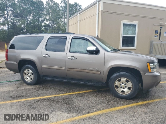 2012 Chevrolet Suburban LT с VIN 1GNSCJE07CR268873, выставлен на аукционе Copart как лот 49687245 с пробегом 229 015 миль миль и Чистый • Clean title. История ставок и продаж доступна на DreamBid. Изображение 4.