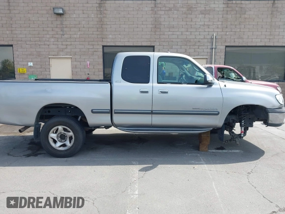 2001 Toyota Tundra SR5 with VIN 5TBRN34101S151862, listed as a IAAI auction lot 42130664 with 228,990 mi miles and . Bid and sale history available at DreamBid. Image 14.