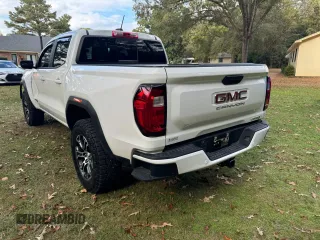 2023 GMC Canyon 4WD AT4 with VIN 1GTP6DEK1P1139203, listed as a Copart auction lot 80591804 with 17,468 mi miles and Clean Title. Bid and sale history available at carsss.com. Image 3.