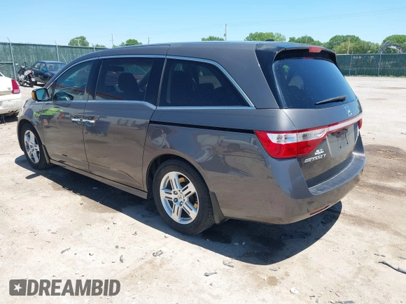 2012 Honda Odyssey Touring with VIN 5FNRL5H93CB109394, listed as a IAAI auction lot 42280018 with 190,412 mi miles and . Bid and sale history available at DreamBid. Image 3.