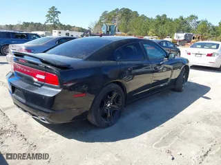 2011 Dodge Charger RT Plus with VIN 2B3CL5CT0BH615770, listed as a IAAI auction lot 41854093 with 134,258 mi miles. Bid and sale history available at carsss.com. Image 4.