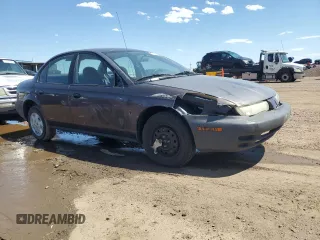 1998 Saturn SL с VIN 1G8ZH528XWZ140961, выставлен на аукционе Copart как лот 61259575 с пробегом 237 291 миль миль и Списание • Salvage title. История ставок и продаж доступна на DreamBid. Изображение 4.