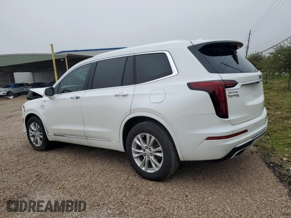 2021 Cadillac XT6 Luxury z VIN 1GYKPAR46MZ132157, wystawiony jako Copart lot #83911054 z przebiegiem 59 473 mil mil oraz Czysty tytuł • Clean title. Historia ofert i sprzedaży dostępna na DreamBid. Obrazek 2.