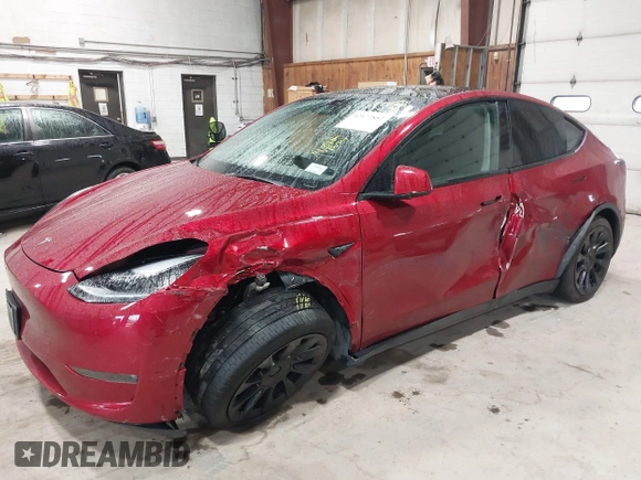 2024 Tesla Model Y Long Range with VIN 7SAYGAEE2RF986206, listed as a IAAI auction lot 42177852 with 14,399 mi miles and . Bid and sale history available at DreamBid. Image 6.